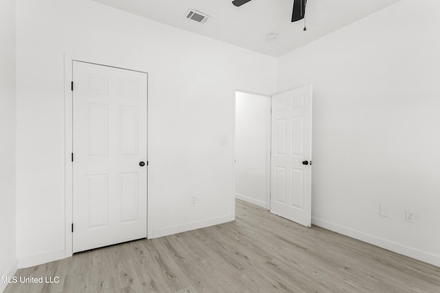 14789 Nassau Dr, Biloxi, MS 39532 - unfurnished bedroom featuring wood finished floors and a ceiling fan