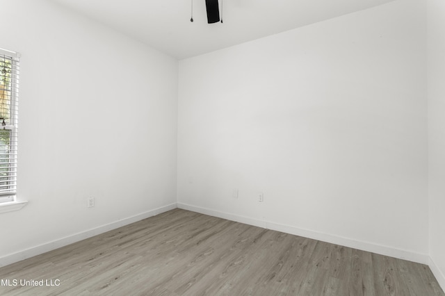 14789 Nassau Dr, Biloxi, MS 39532 - spare room featuring wood finished floors and a ceiling fan
