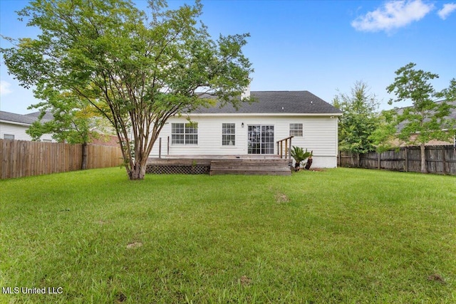 14789 Nassau Dr, Biloxi, MS 39532 - back of property featuring a fenced backyard and a wooden deck