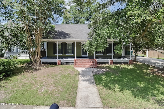 view of front of house featuring a front yard and a porch