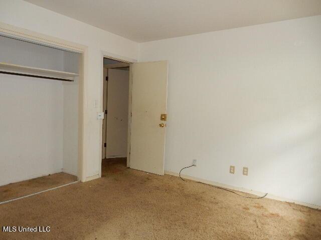 1510 Springridge Dr, Jackson, MS 39211 - unfurnished bedroom with carpet floors and a closet