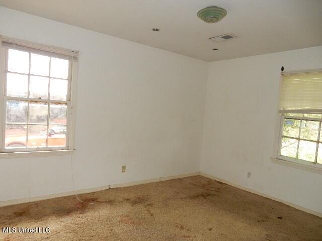 1510 Springridge Dr, Jackson, MS 39211 - carpeted empty room with baseboards