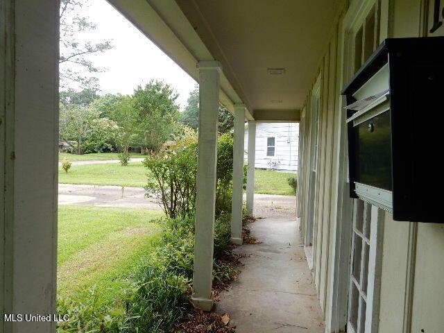 1510 Springridge Dr, Jackson, MS 39211 - covered porch with a yard