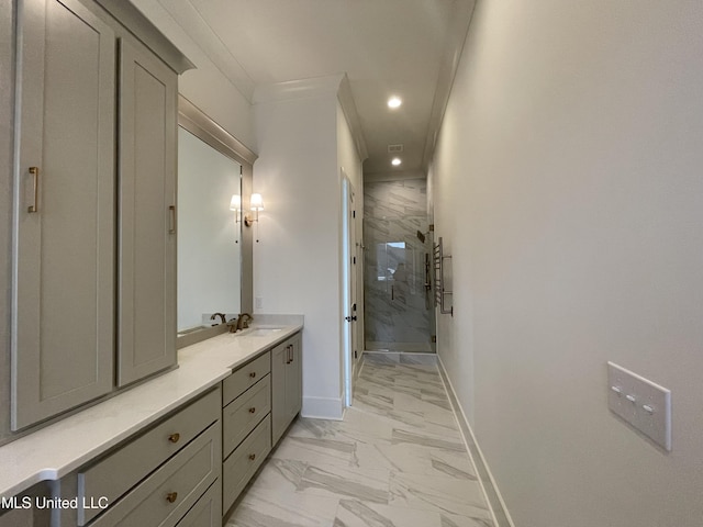 bathroom with a shower with door and vanity