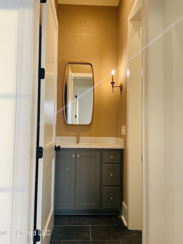 bathroom featuring tile patterned floors and vanity