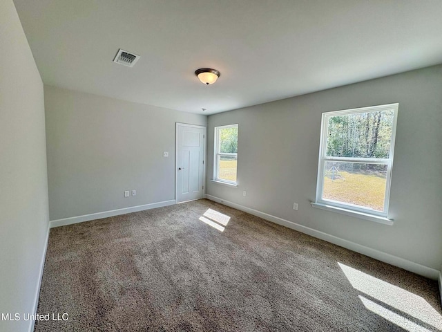 18085 Tiffany Renee Dr, Gulfport, MS 39503 - carpeted spare room featuring baseboards and visible vents
