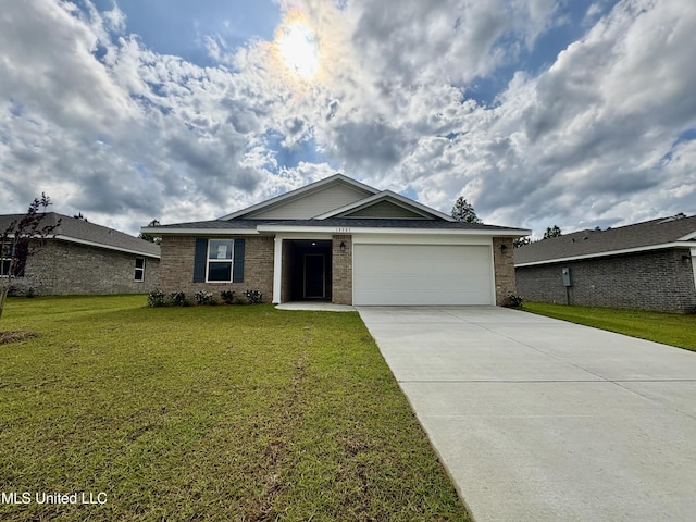 18085 Tiffany Renee Dr, Gulfport, MS 39503 - single story home with a garage, concrete driveway, a front yard, and brick siding