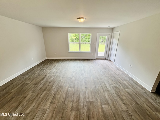 18085 Tiffany Renee Dr, Gulfport, MS 39503 - unfurnished room featuring baseboards and dark wood-style flooring