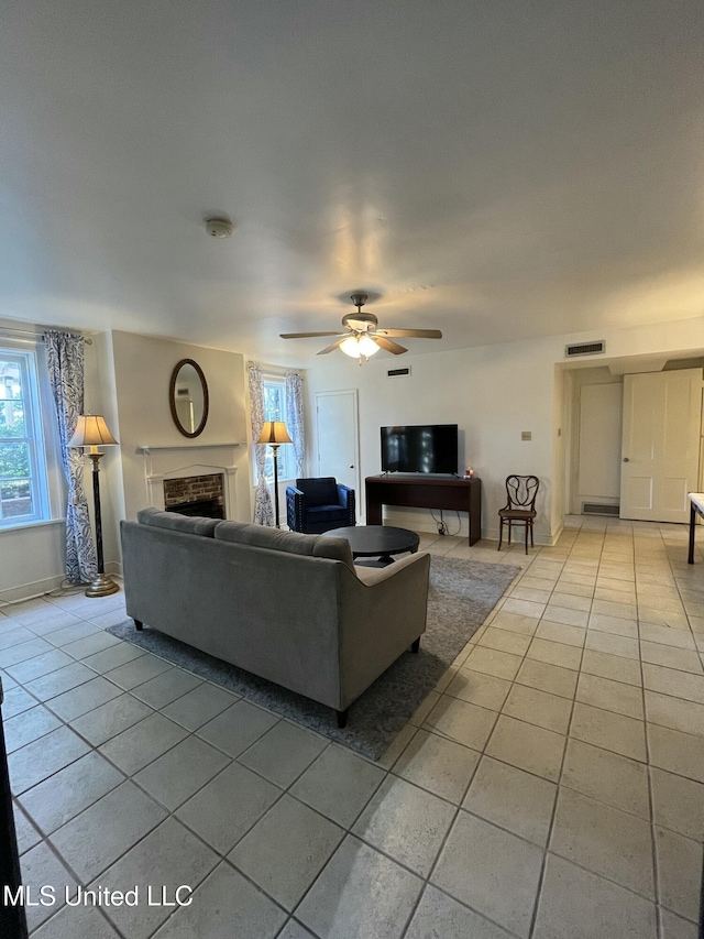 305 N Rankin St, Natchez, MS 39120 - living room with ceiling fan and light tile patterned floors