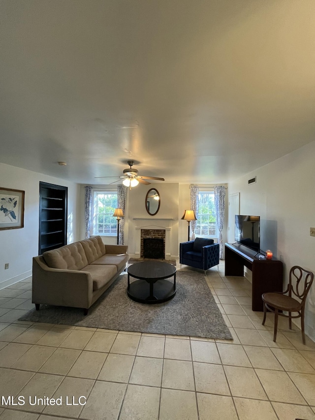 305 N Rankin St, Natchez, MS 39120 - living room with ceiling fan and light tile patterned flooring