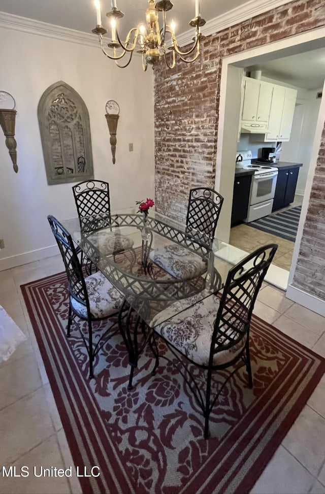 305 N Rankin St, Natchez, MS 39120 - dining space with brick wall, light tile patterned floors, ornamental molding, and a notable chandelier