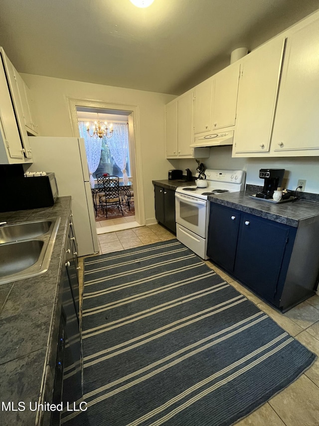 305 N Rankin St, Natchez, MS 39120 - kitchen with sink, white electric range oven, light tile patterned floors, an inviting chandelier, and white cabinets