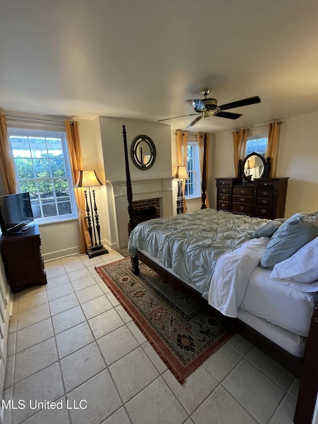 305 N Rankin St, Natchez, MS 39120 - bedroom with ceiling fan and light tile patterned floors