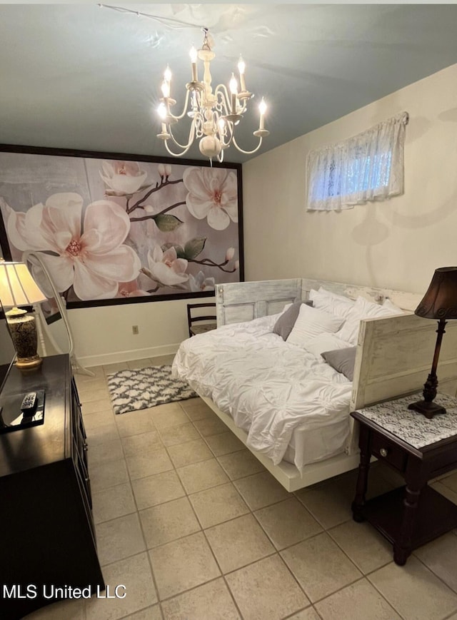 305 N Rankin St, Natchez, MS 39120 - bedroom with tile patterned flooring and a chandelier