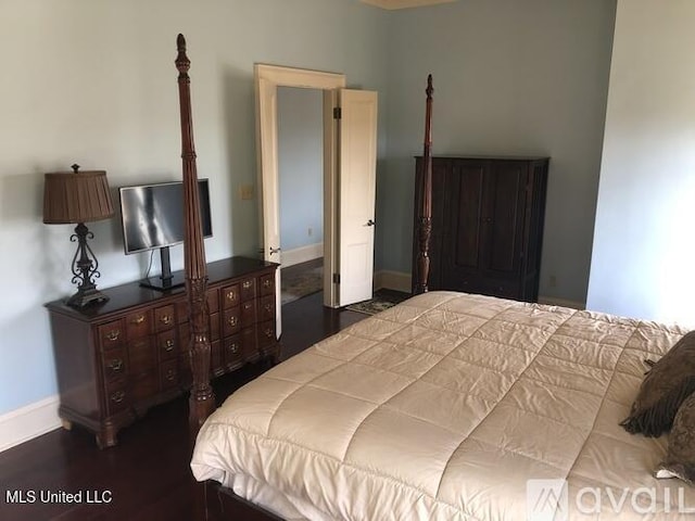 305 N Rankin St, Natchez, MS 39120 - bedroom featuring dark hardwood / wood-style flooring