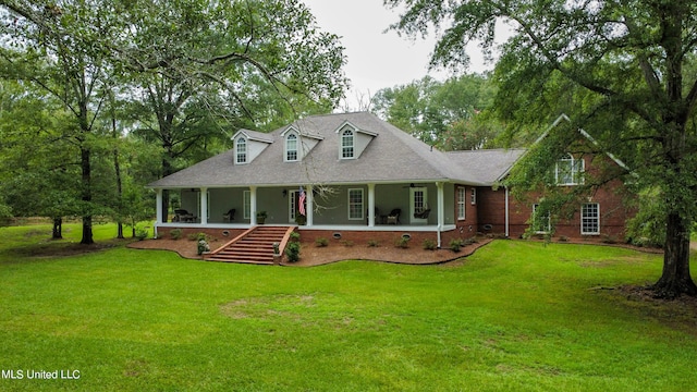 view of front facade featuring a porch and a front lawn