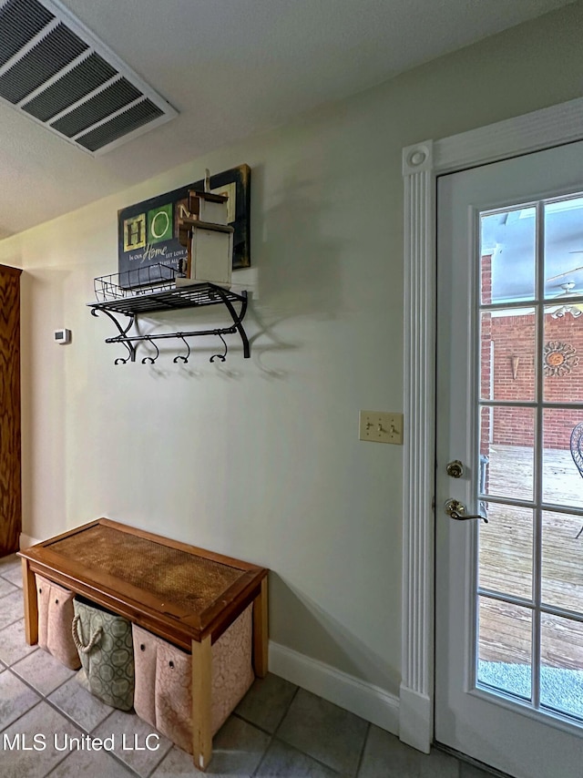 mudroom featuring tile patterned floors