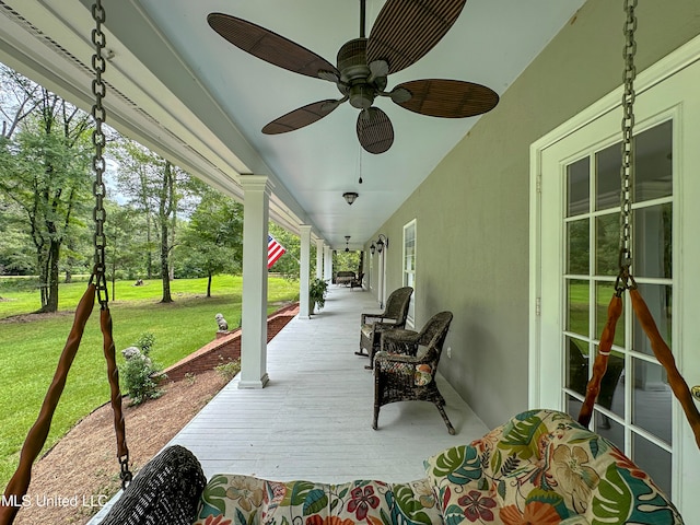 view of patio featuring ceiling fan