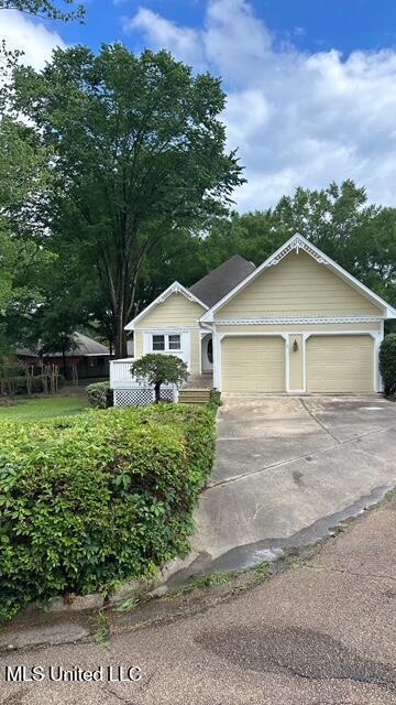 202 Kilford Ct, Madison, MS 39110 - view of front of property with a garage and driveway
