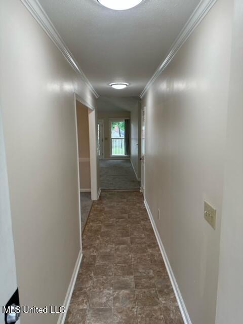 202 Kilford Ct, Madison, MS 39110 - hall featuring crown molding and baseboards