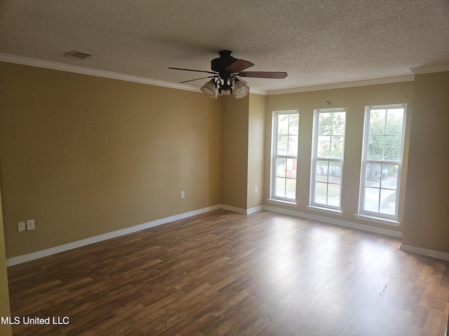 empty room with ceiling fan, a textured ceiling, dark hardwood / wood-style flooring, and ornamental molding