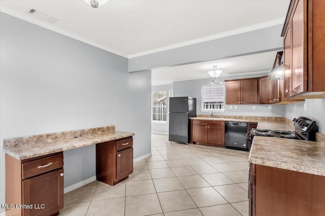 kitchen featuring black appliances, built in desk, light tile patterned floors, and crown molding