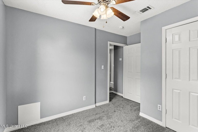 unfurnished bedroom with carpet and ceiling fan