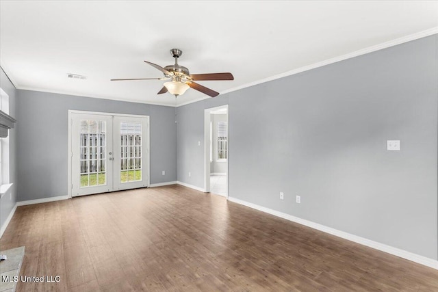 unfurnished room with french doors, hardwood / wood-style flooring, ceiling fan, and ornamental molding