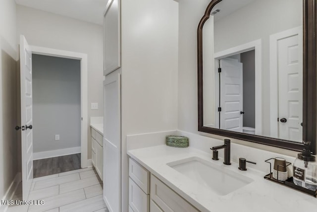16043 W Dedeaux Rd, Gulfport, MS 39503 - bathroom with vanity and toilet