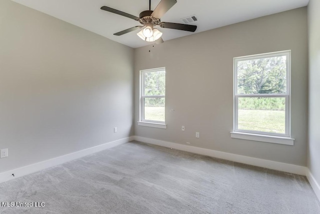 16043 W Dedeaux Rd, Gulfport, MS 39503 - unfurnished room with light carpet, healthy amount of natural light, and a ceiling fan