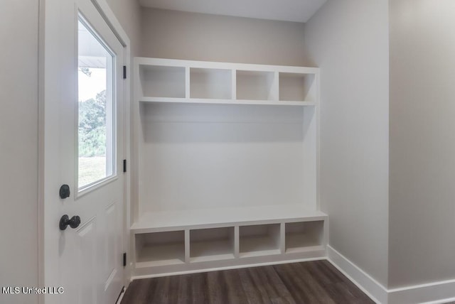 16043 W Dedeaux Rd, Gulfport, MS 39503 - mudroom with dark wood finished floors and baseboards