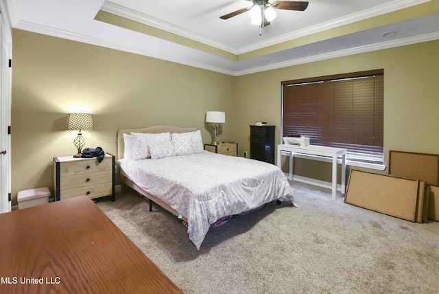 7520 Ogborn Dr, Moss Point, MS 39562 - bedroom featuring carpet, crown molding, a raised ceiling, and a ceiling fan