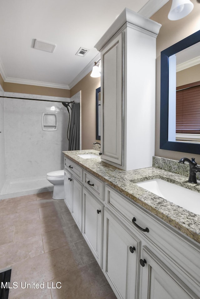 7520 Ogborn Dr, Moss Point, MS 39562 - full bathroom with ornamental molding, double vanity, a shower with curtain, toilet, and tile patterned floors