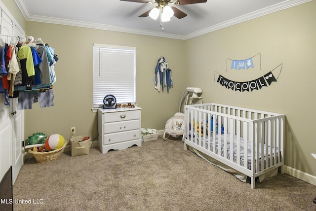 7520 Ogborn Dr, Moss Point, MS 39562 - bedroom with carpet floors, crown molding, a nursery area, baseboards, and a ceiling fan