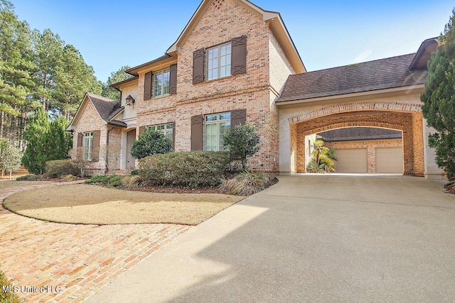 view of front of property with a garage