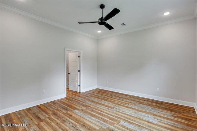 unfurnished room with ceiling fan, light hardwood / wood-style flooring, and ornamental molding