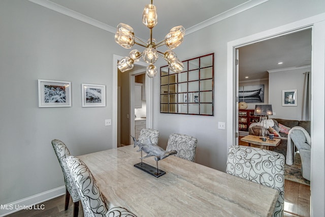 dining space with ornamental molding, dark hardwood / wood-style floors, and a chandelier