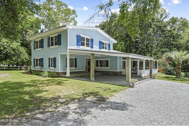 view of front of property with a front lawn