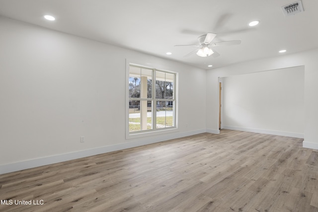 unfurnished room featuring light hardwood / wood-style flooring and ceiling fan