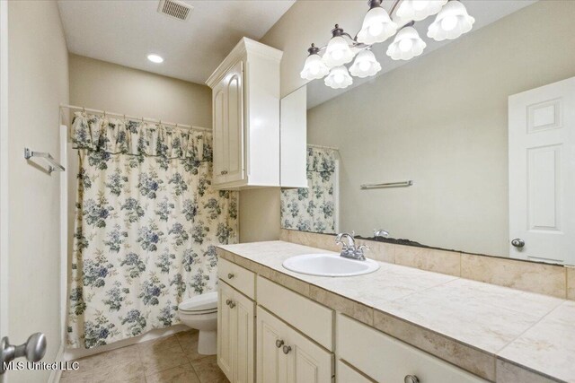 403 Chesney Ct, Madison, MS 39110 - full bathroom featuring toilet, vanity, a chandelier, tile patterned flooring, and curtained shower