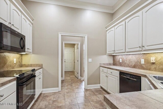 403 Chesney Ct, Madison, MS 39110 - kitchen with black appliances, crown molding, white cabinets, backsplash, and light countertops