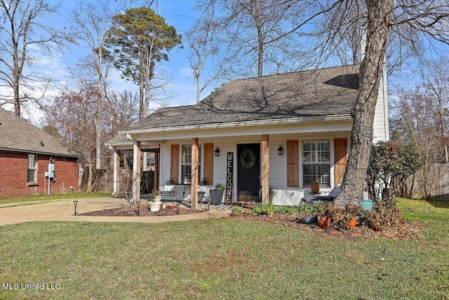 bungalow-style home with a porch and a front lawn