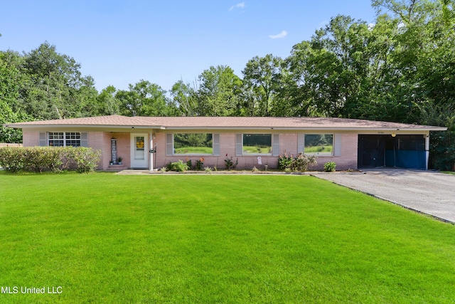 single story home with a carport and a front lawn