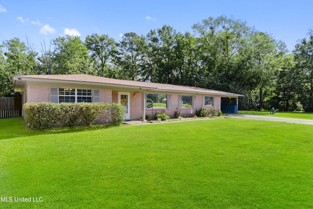 single story home with a front yard