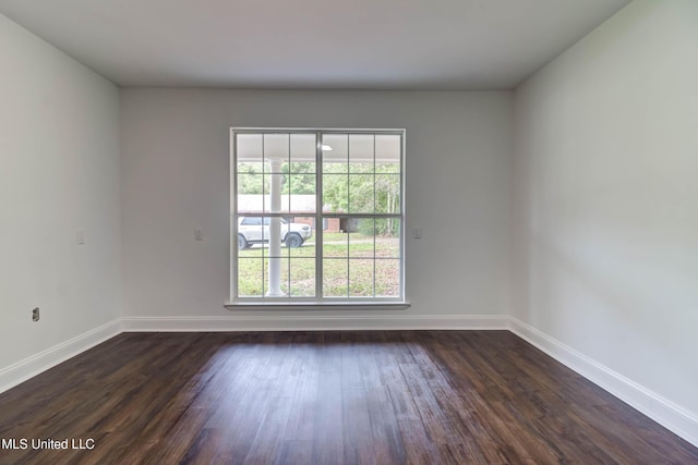 12394 Cypress Dr, Gulfport, MS 39503 - unfurnished room featuring dark wood-type flooring and baseboards