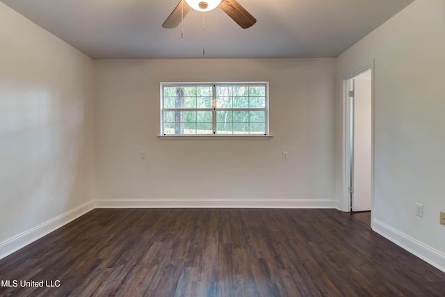 12394 Cypress Dr, Gulfport, MS 39503 - unfurnished room featuring dark wood-style floors, a ceiling fan, and baseboards