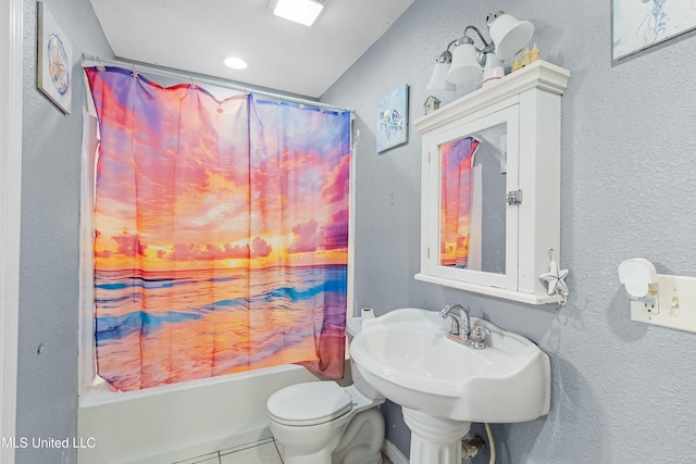 bathroom with shower / tub combo, tile patterned floors, and toilet