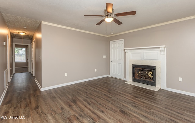 unfurnished living room with a textured ceiling, dark hardwood / wood-style flooring, ceiling fan, and ornamental molding