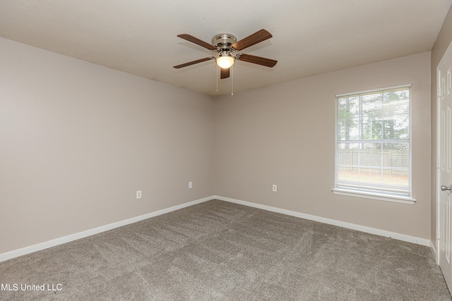 unfurnished room with carpet and ceiling fan