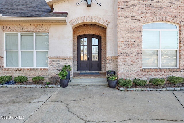 property entrance featuring french doors